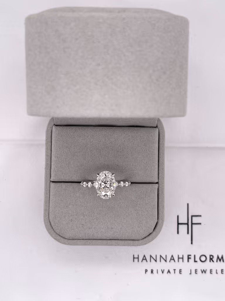 Oval Engagement Ring with Single Prong Diamond Setting