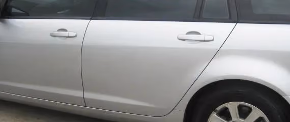 Image of a Holden Commodore after repair, showcasing a flawless finish.