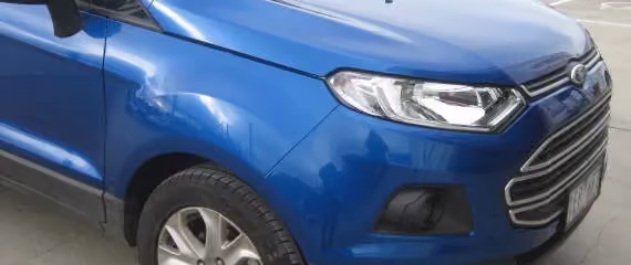 Photograph of a Ford EcoSport after professional repair, presenting a pristine and refurbished exterior.