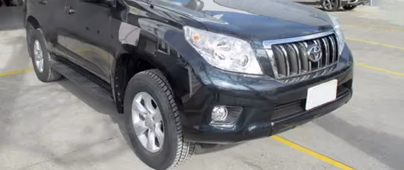 Photo of a Toyota Land Cruiser Prado after repair, displaying the vehicle in restored condition.