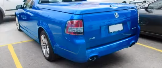 Image of a Holden VE SV6 after repair, showcasing a sleek and restored exterior.