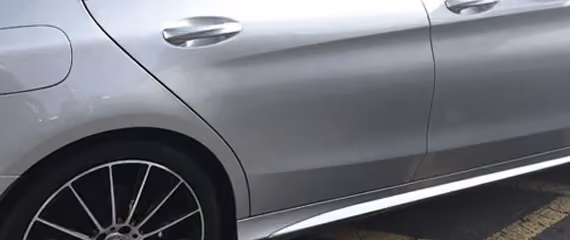 Image of a Mercedes vehicle after repair, highlighting the luxurious finish and meticulous detail in the restoration.