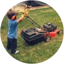 An icon of a young boy mowing the lawn.