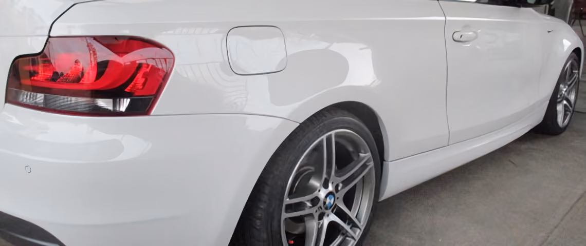 After-repair photo of a BMW, enhanced to show off the meticulous detailing and high-gloss finish.