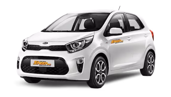 Vibrant image of a compact Kia Picanto, depicted in a lively urban setting, suitable for city driving.