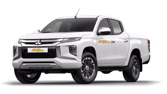 Robust image of a Mitsubishi Triton pickup truck.