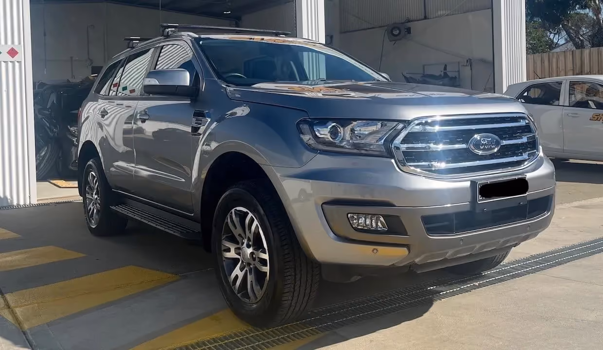 Photo of a Ford Everest post-repair, showcasing its robust and clean appearance.