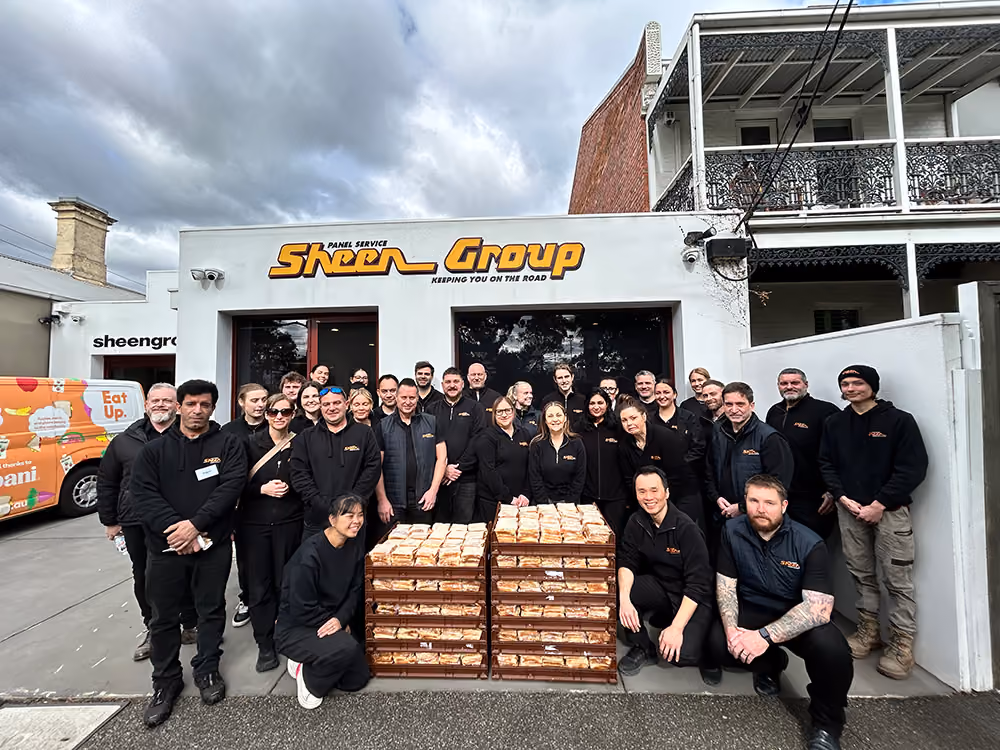 Sheen team members with sandwiches prepared for Eat Up Australia.