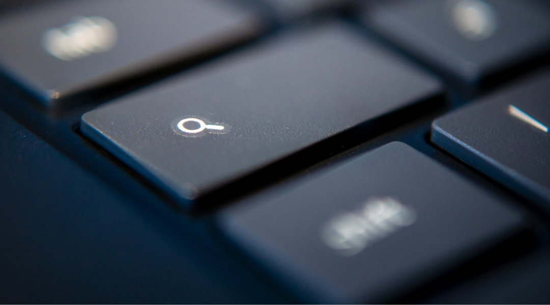 A close up of a Windows keyboard with a emphasis on a magnifying key