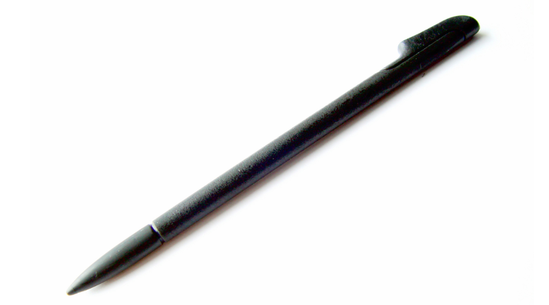 A black stylus pen with a white background