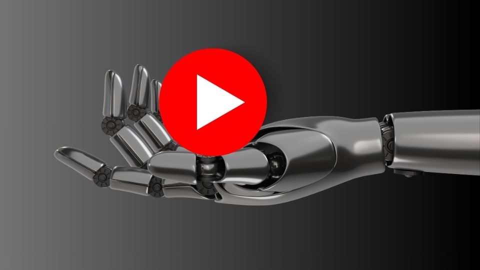 A robot hand holding the YouTube red play button.