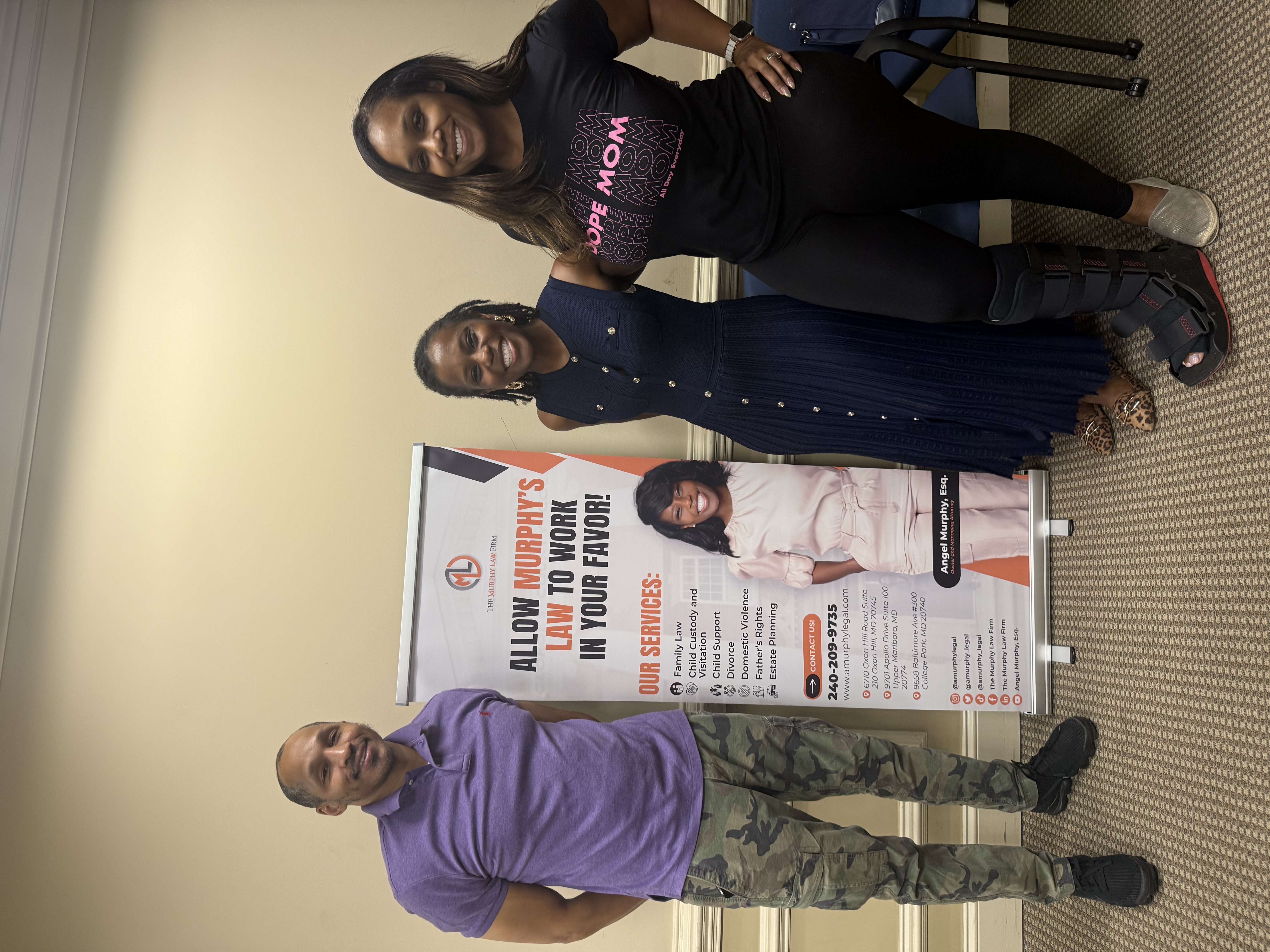 Angel Murphy and A Client in the Courthouse after winning a case