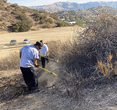Technicians clearing a lot before production.