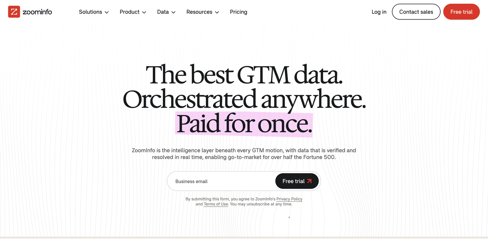 ZoomInfo homepage hero with the headline The best GTM data. Orchestrated anywhere. and a free trial signup form