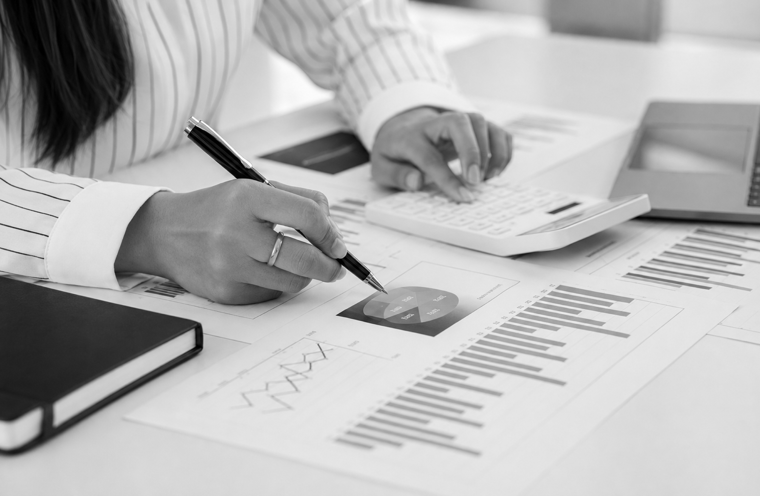 Credit analyst reviewing a manual override in equipment finance underwriting.