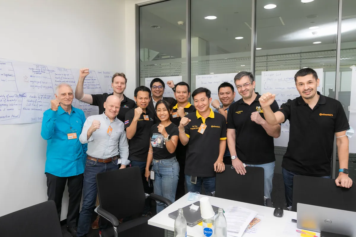 Continental Tyres (Thailand) plant team cheering after a TIPS workshop