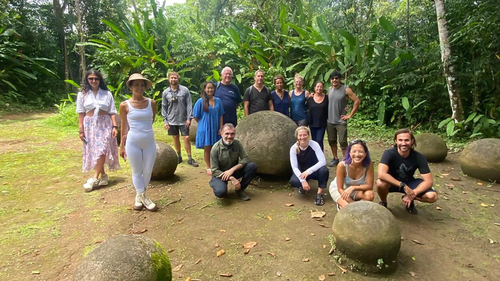 Group smiling into the camera in the jungle in Costa Rica