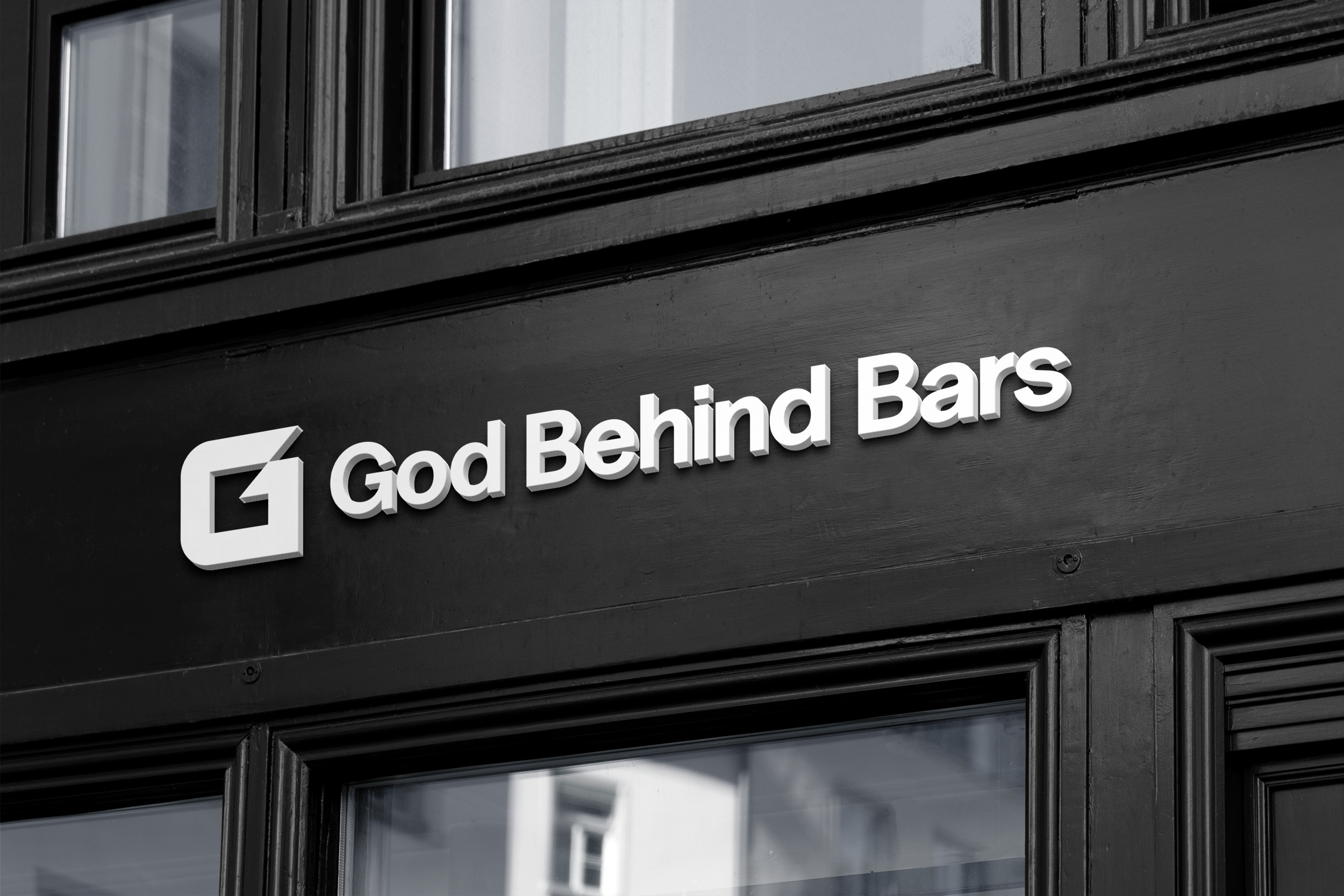 God Behind Bars logo above the entrance to a building