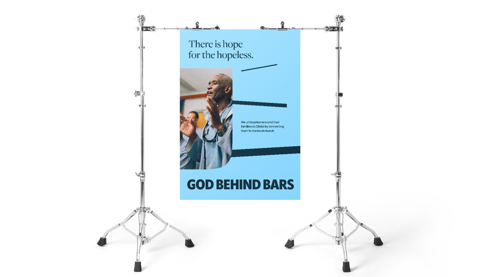 an example of a God Behind Bars banner on stands