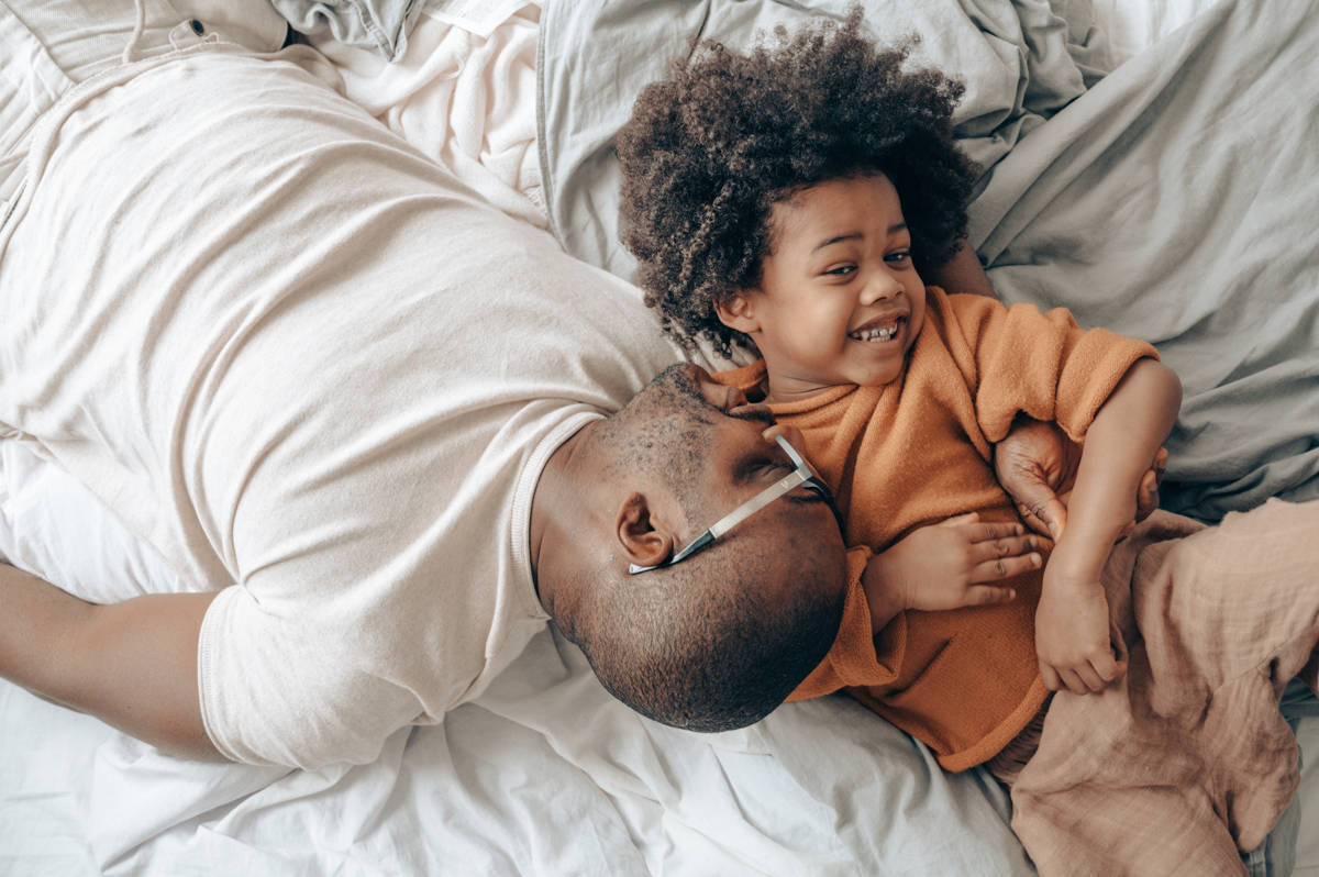 Father and son playing