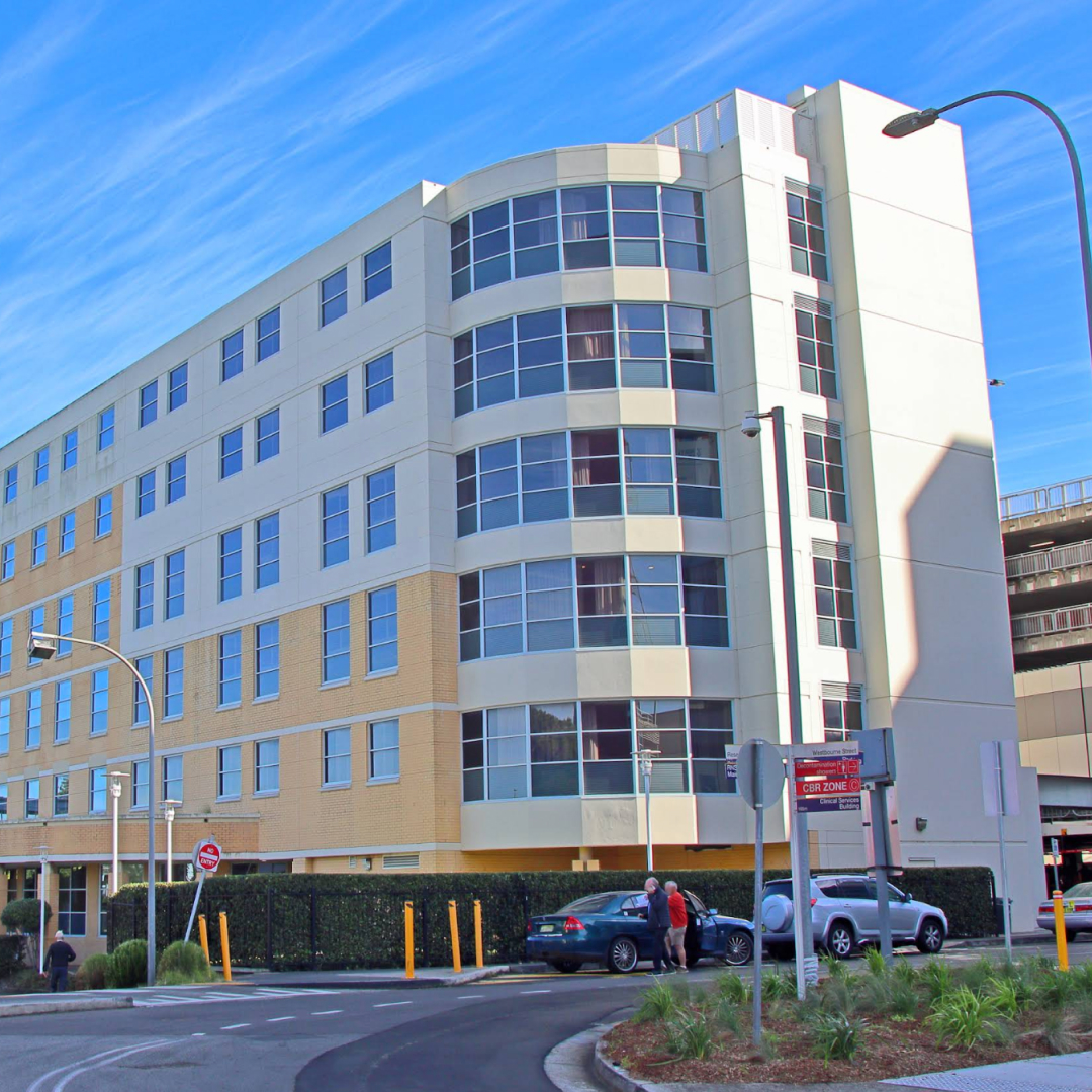 A cozy room with a couch, coffee table, and comfortable chairs, creating a warm and inviting atmosphere.