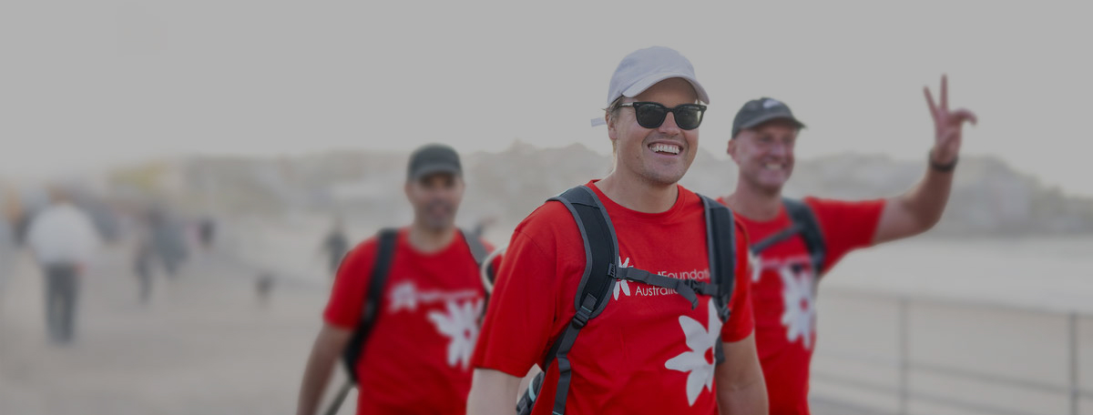 A mother holds a new-born baby and her young son. The Perinatal Mental Health Week Logo appears on the left of the image.