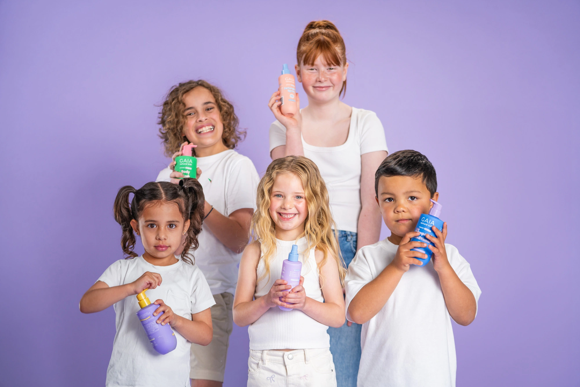 Kids pose with the GAIA natural kids product range.
