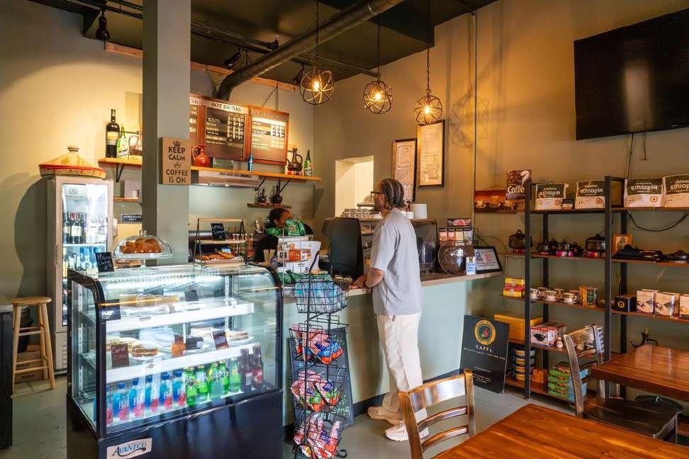 Renovated dining room at Kaffa Coffee & Wine Bar with open seating