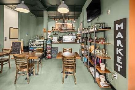 Guests seated inside the reopened Kaffa Coffee & Wine Bar