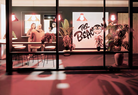 Architectural rendering of a storefront at night with red lighting, plants, and a sign reading 'The Beacon