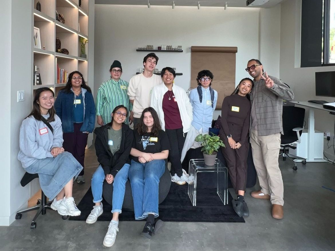 Group photo of La Union Studio team with UW architecture students in the studio office