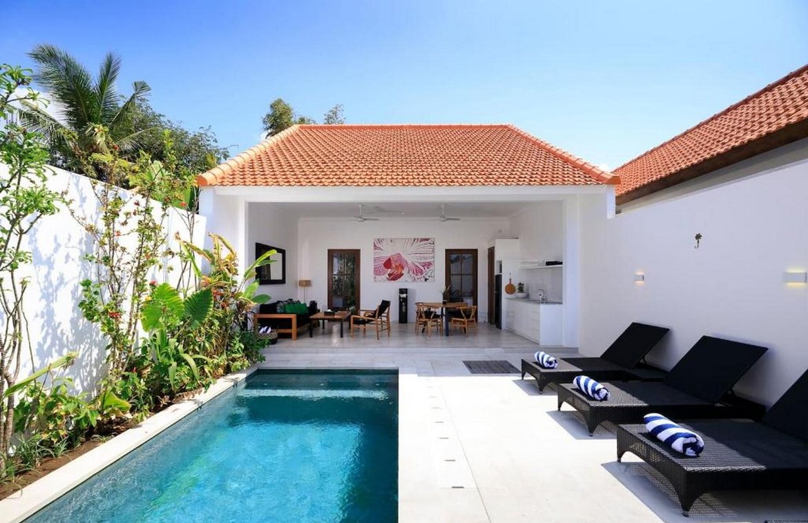 Positioned at an incomparable location in Seminyak, this brand new 2-bedroom villa is located just 400m from the beach and a stroll to Kayu Aya street with trendy shops and restaurants. Single level building on 170 sqm land, the living and dining area with modern kitchen is open onto 6 m x 2.5m pool surrounded by tropical plants. The two bedrooms are side by side, all air-conditioning, and have built-in wardrobes. The en-suite bathroom is cleverly designed with a spacious shower, toilet, and a beautiful vanity. Great design for holiday homes or to generate high-yield rental income from holiday rentals. The property comes unfurnished for a lucky buyer to personalize the interior, but a furniture package is available too. Offered on lease until 19th December 2045 with a 25-year extension on market price. The one-bedroom villa is also offered off-plan at USD 220,000 or the option to get a 3-bedroom villa. **Some pictures are taken from a similar 1-bed villa by the same developer.