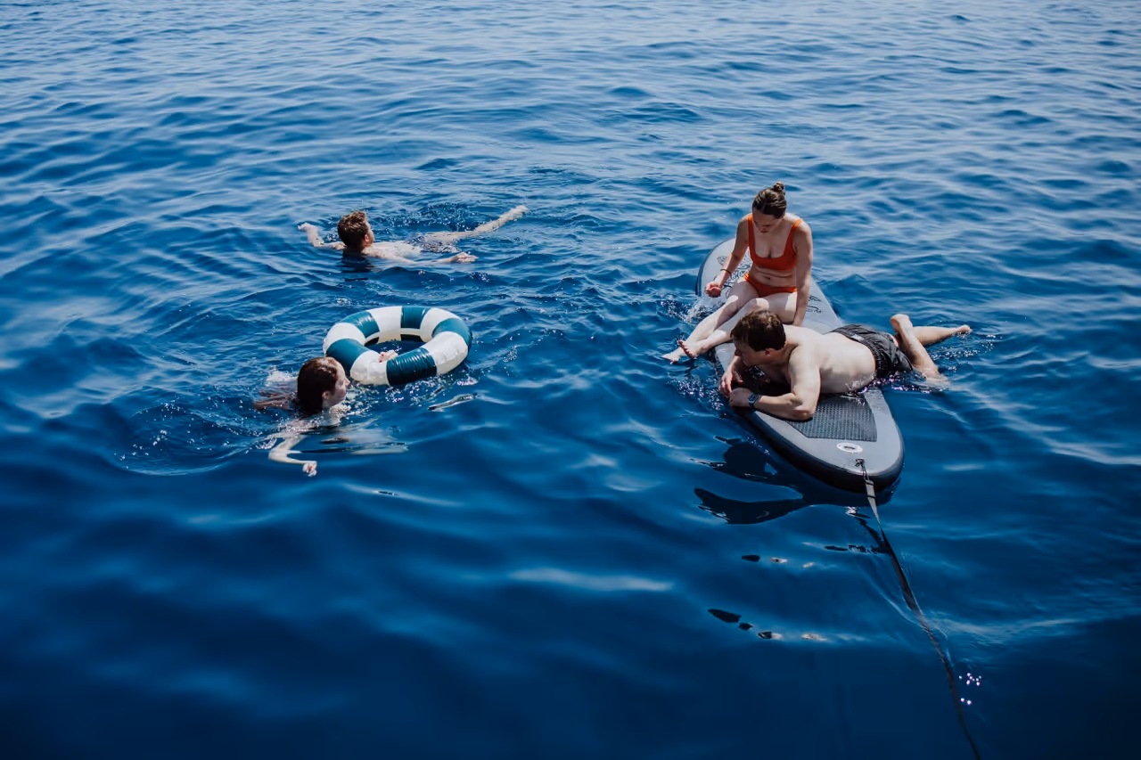Swim stop sailing trip on a boat in Barcelona