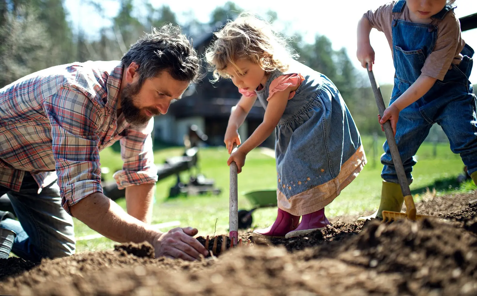 A family digging a hole