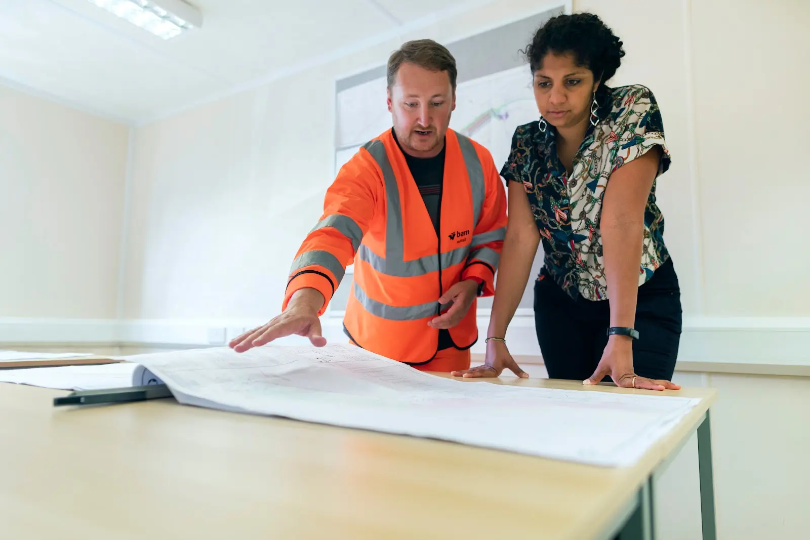 Man and woman working in a room