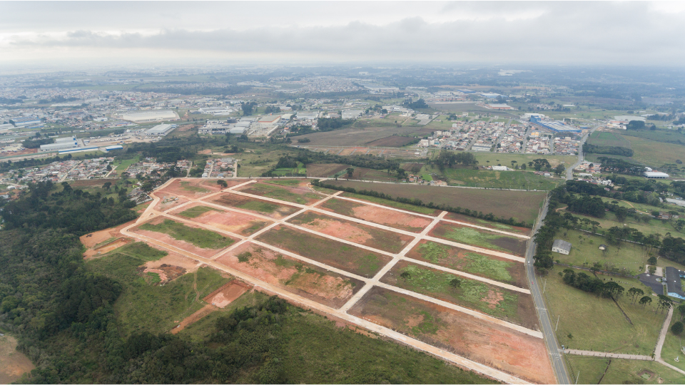 An aerial view of a construction site in the countryside
