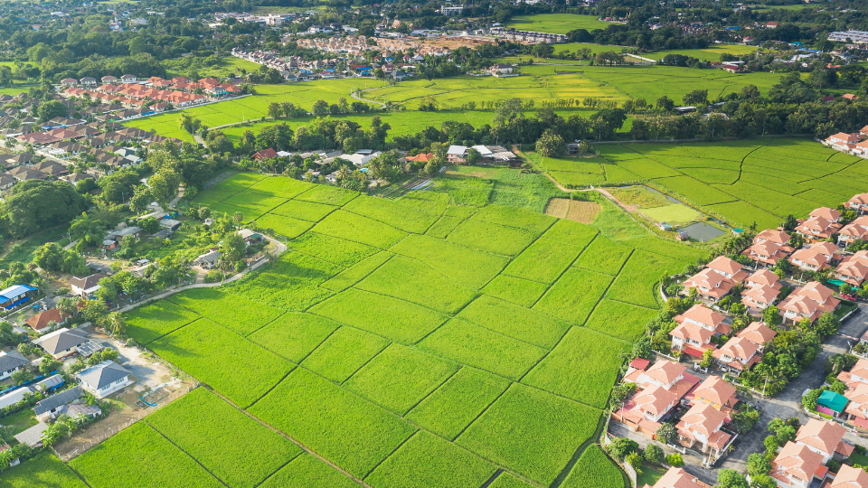 An aerial view of a large plot of land in a rural area