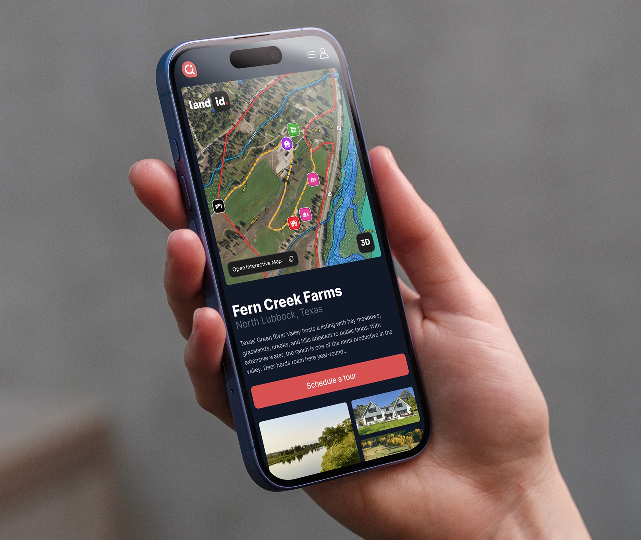 A hand holding an iphone displaying the Land id mobile app