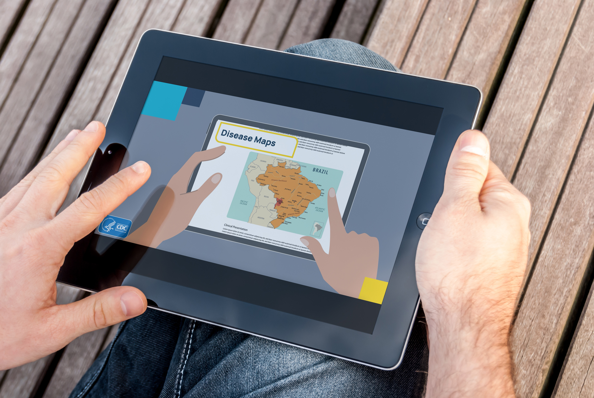 Hands holding a tablet showing the Yellow Book “Disease Maps” web banner, with an illustrated map of Brazil.
