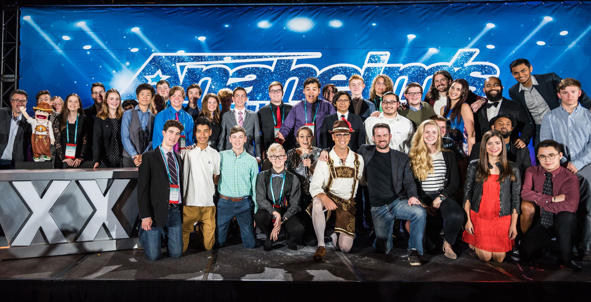 The 2019 Teen Impact Awards honorees gathered on stage in front of the Anaheim's Got Talent backdrop.