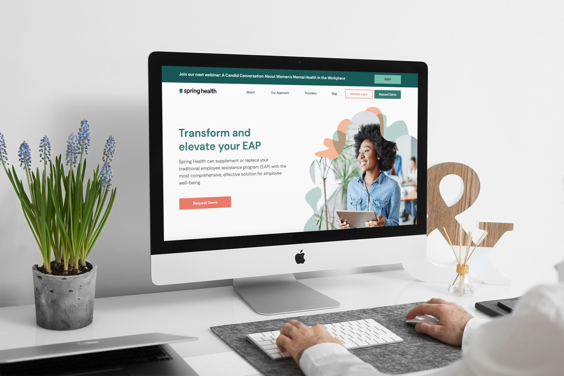 A desktop screen showing the Spring Health landing page headed “Transform and elevate your EAP.”