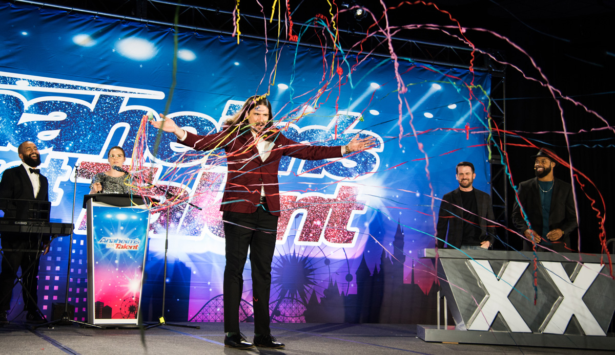 Presenter on stage at the 2019 Teen Impact Awards