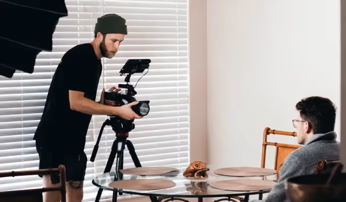 Cameraman shooting interviewee