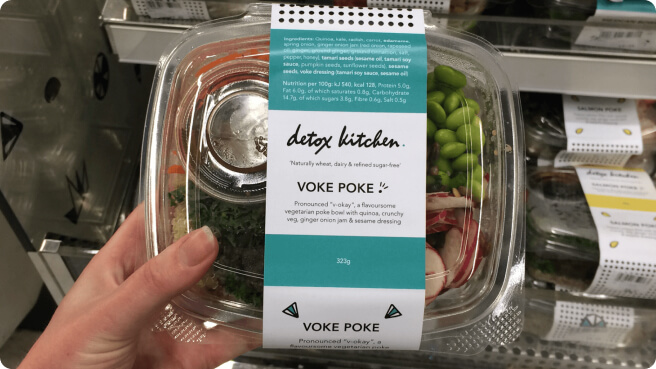 Packing designs sold in.a department store. The packaging is for 'Voke Poke' It reads: "Pronounced 'v-okay', a flavoursome vegetarian poke bowl with quinoa, crunchy veg, ginger onion jam and sesame dressing"