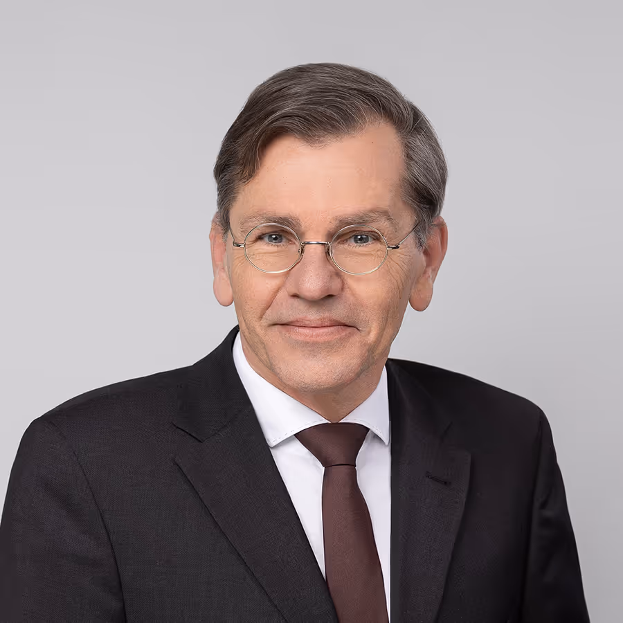 A man in a black suit