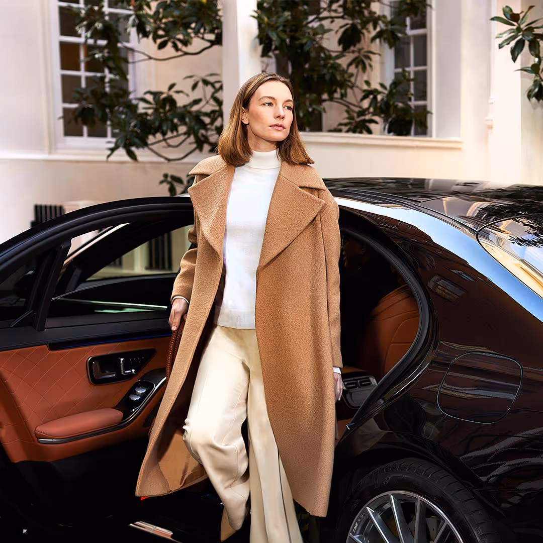 A woman leaving a car