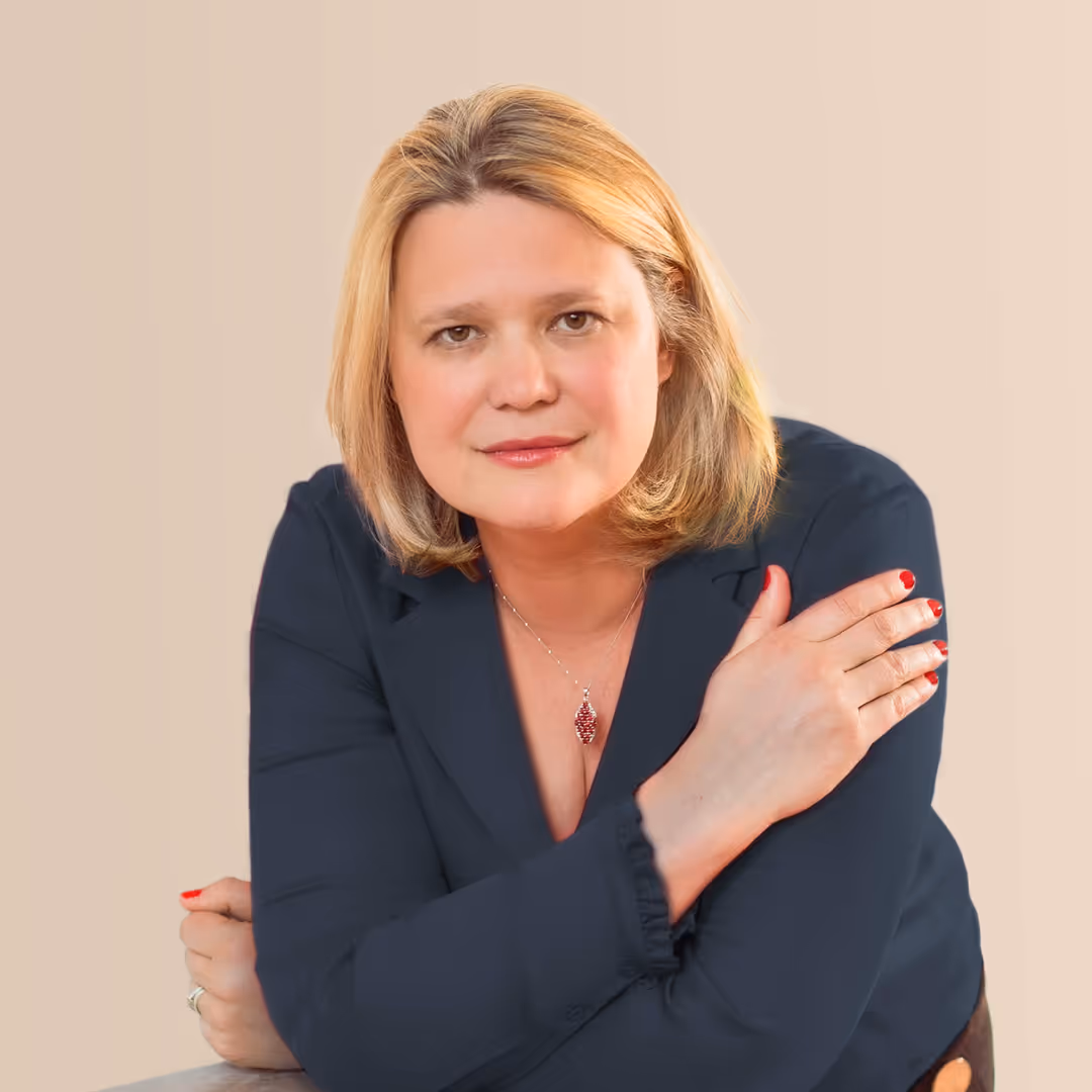 A blonde woman in a blue shirt