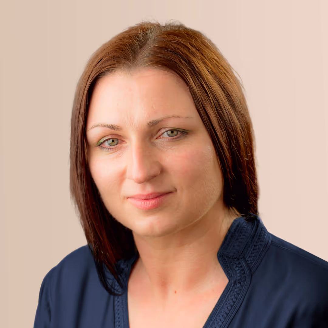 A woman in a blue shirt