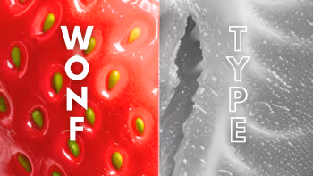 Close-up of a strawberry split in half, left side in color with text 'WONF' and right side in black and white with text 'TYPE'.
