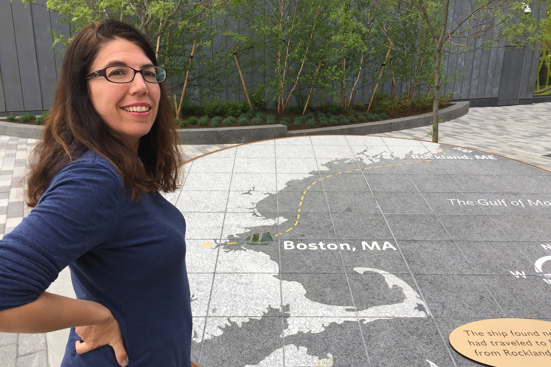 Designer at Harborway project site, looking over shoulder